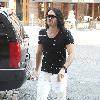 Russell Brand walking back to his hotel in Manhattan's Meatpacking District, carrying a bottled water and a script
New York City, USA.
