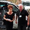 Jessie Wallace dressed in character as Pat Pheonix
arrives at the BBC Television studios prior to filming for the new BBC4 drama 'Florizel Street'.
Manchester, England.