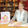 Julie Andrews 
signs copies of her children's book