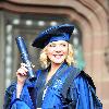 Sex and The City Actress Kim Cattrall
received an honorary degree at the Anglican cathedral in Liverpool, from Liverpool John Moores University. 
She was joined by her family on the steps of the cathedral after the ceremony
Liverpool, England - 12.07.10
Mandatory Credit:IANS- WENN