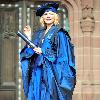 Sex and The City Actress Kim Cattrall
received an honorary degree at the Anglican cathedral in Liverpool, from Liverpool John Moores University. 
She was joined by her family on the steps of the cathedral after the ceremony
Liverpool, England - 12.07.10
Mandatory Credit:IANS- WENN