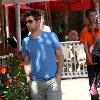 Adam Scott shops at the Apple store in The Grove Los Angeles.