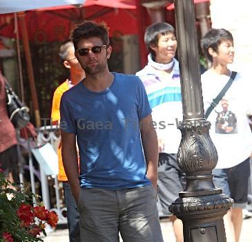 Adam Scott shops at the Apple store in The Grove Los Angeles.