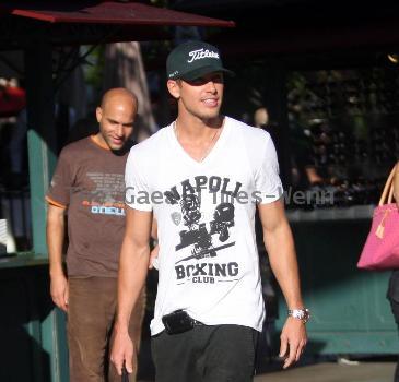 Adam Senn walks his dog whilst shopping at The Grove with a friend Los Angeles.