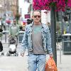 Todd Carty out and about in Leeds Town centre holding a grocery bag.
London, England.