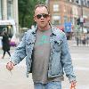 Todd Carty out and about in Leeds Town centre holding a grocery bag.
London, England.