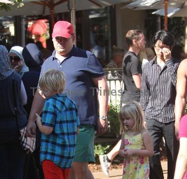 Andy Richter takes his children to watch a movie in The Grove Los Angeles.