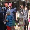 Andy Richter takes his children to watch a movie in The Grove Los Angeles.