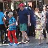 Andy Richter takes his children to watch a movie in The Grove Los Angeles.