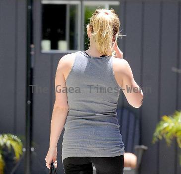 Hilary  Duff 
arriving at her personal trainer's house in West Hollywood with her fiance
Los Angeles, California.