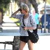 Renee Zellweger goes for a stroll down Montana Street in her jogging gear and with a purple bandage on her left shin Santa Monica.