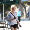 Renee Zellweger goes for a stroll down Montana Street in her jogging gear and with a purple bandage on her left shin Santa Monica.