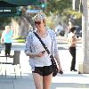 Renee Zellweger goes for a stroll down Montana Street in her jogging gear and with a purple bandage on her left shin Santa Monica.