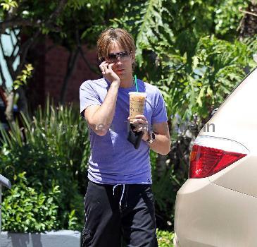 Larry Birkhead 
departs Starbuck after getting and iced coffee
Los Angeles, California.