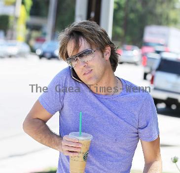 Larry Birkhead 
departs Starbuck after getting and iced coffee
Los Angeles, California.