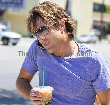 Larry Birkhead 
departs Starbuck after getting and iced coffee
Los Angeles, California.