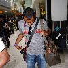 Ashley Cole 
arriving at Heathrow airport
London, England.