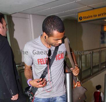 Ashley Cole 
arriving at Heathrow airport
London, England.