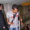 Ashley Cole 
arriving at Heathrow airport
London, England.