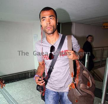 Ashley Cole 
arriving at Heathrow airport
London, England.