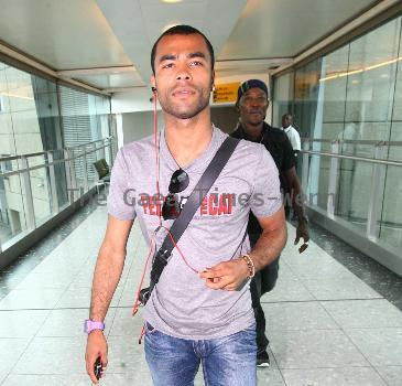 Ashley Cole 
arriving at Heathrow airport
London, England.