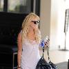 Dina Lohan 
arrives back at her apartment after spending the day with her daughter at Pickford Lofts sober living facility
Los Angeles, California.