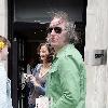 REM guitarist Peter Buck 
leaving the BBC Radio Two studios where he was promoting his new side project, Tired Pony
London, England.