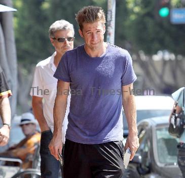 Scott Speedman buying books in Los Feliz wearing old brown boots
Los Angeles, California.