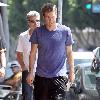 Scott Speedman buying books in Los Feliz wearing old brown boots
Los Angeles, California.