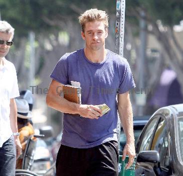 Scott Speedman buying books in Los Feliz wearing old brown boots
Los Angeles, California.