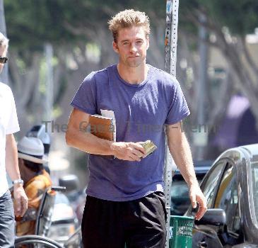 Scott Speedman buying books in Los Feliz wearing old brown boots
Los Angeles, California.