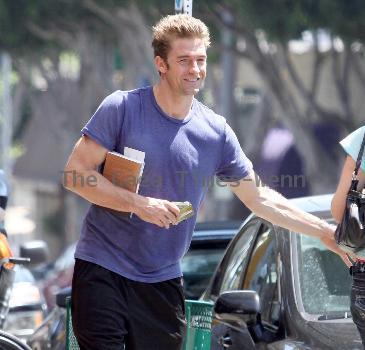 Scott Speedman buying books in Los Feliz wearing old brown boots
Los Angeles, California.