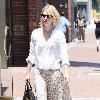 January Jones is seen walking  her dog  and then heads to the Gavert Atelier Hair Salon in Beverly Hills.Los Angeles.