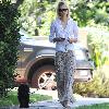 January Jones is seen walking  her dog  and then heads to the Gavert Atelier Hair Salon in Beverly Hills.Los Angeles.