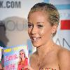 Kendra Wilkinson 
greets fans and signs her book 'Sliding Into Home' at the One Group Lifestyle Retreat at Gansevoort South  
Miami Beach, Florida.