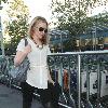 Kylie Minogue arriving at London's Heathrow Airport to catch a flight to Australia London.