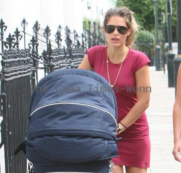 Carly Zucker with her baby Ruby and a friend go for a walk.Footballer husband, Joe Cole, has just signed for Liverpool Football Club, so it may be the last time we see Carly strolling along the Kings Road area in Chelsea.  London.