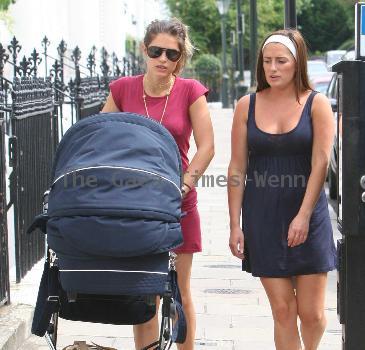 Carly Zucker with her baby Ruby and a friend go for a walk.Footballer husband, Joe Cole, has just signed for Liverpool Football Club, so it may be the last time we see Carly strolling along the Kings Road area in Chelsea.  London.