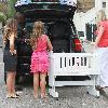 Carley Zucker loading her car with luggage and a cot, as she prepares to move to Liverpool, where footballer husband, Joe Cole, has just signed up for the Football Club.  London.