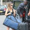 Carley Zucker loading her car with luggage and a cot, as she prepares to move to Liverpool, where footballer husband, Joe Cole, has just signed up for the Football Club.  London.