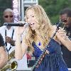 Sheryl Crow performs on CBS' 'The Early Show' at CBS Plaza in New York City. New York City.