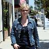 Jane Lynch leaves Kings Road Cafe in very loose track pants Los Angeles.