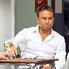 Radio Talk SPORT host and Ex-Chelsea footballer Jason Cundy. He also the husband of Television presenter Lizzie Cundy, enjoys a glass of wine near Waterloo Train Station London.