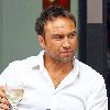 Radio Talk SPORT host and Ex-Chelsea footballer Jason Cundy. He also the husband of Television presenter Lizzie Cundy, enjoys a glass of wine near Waterloo Train Station London.