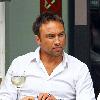 Radio Talk SPORT host and Ex-Chelsea footballer Jason Cundy. He also the husband of Television presenter Lizzie Cundy, enjoys a glass of wine near Waterloo Train Station London.