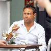 Radio Talk SPORT host and Ex-Chelsea footballer Jason Cundy. He also the husband of Television presenter Lizzie Cundy, enjoys a glass of wine near Waterloo Train Station London.