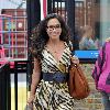 Myleene Klass was spotted outside the GMTV studios in London. The television personality looked very glamorous in a fashionable tiger print dress London.