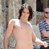 Russell Brand
wears little more than blue underwear while filming a scene on the set of his new movie 'Arthur'
New York City, USA.