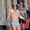 Russell Brand
wears little more than blue underwear while filming a scene on the set of his new movie 'Arthur'
New York City, USA.