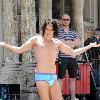 Russell Brand
wears little more than blue underwear while filming a scene on the set of his new movie 'Arthur'
New York City, USA.